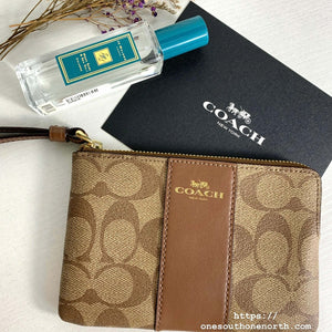 香港現貨 Coach Corner Zip Wristlet In Signature Coated Canvas With Leather Stripe